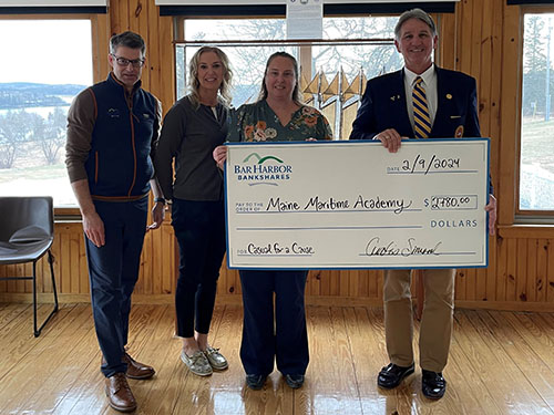 BHBT employees present a donation to Maine Maritime Academy